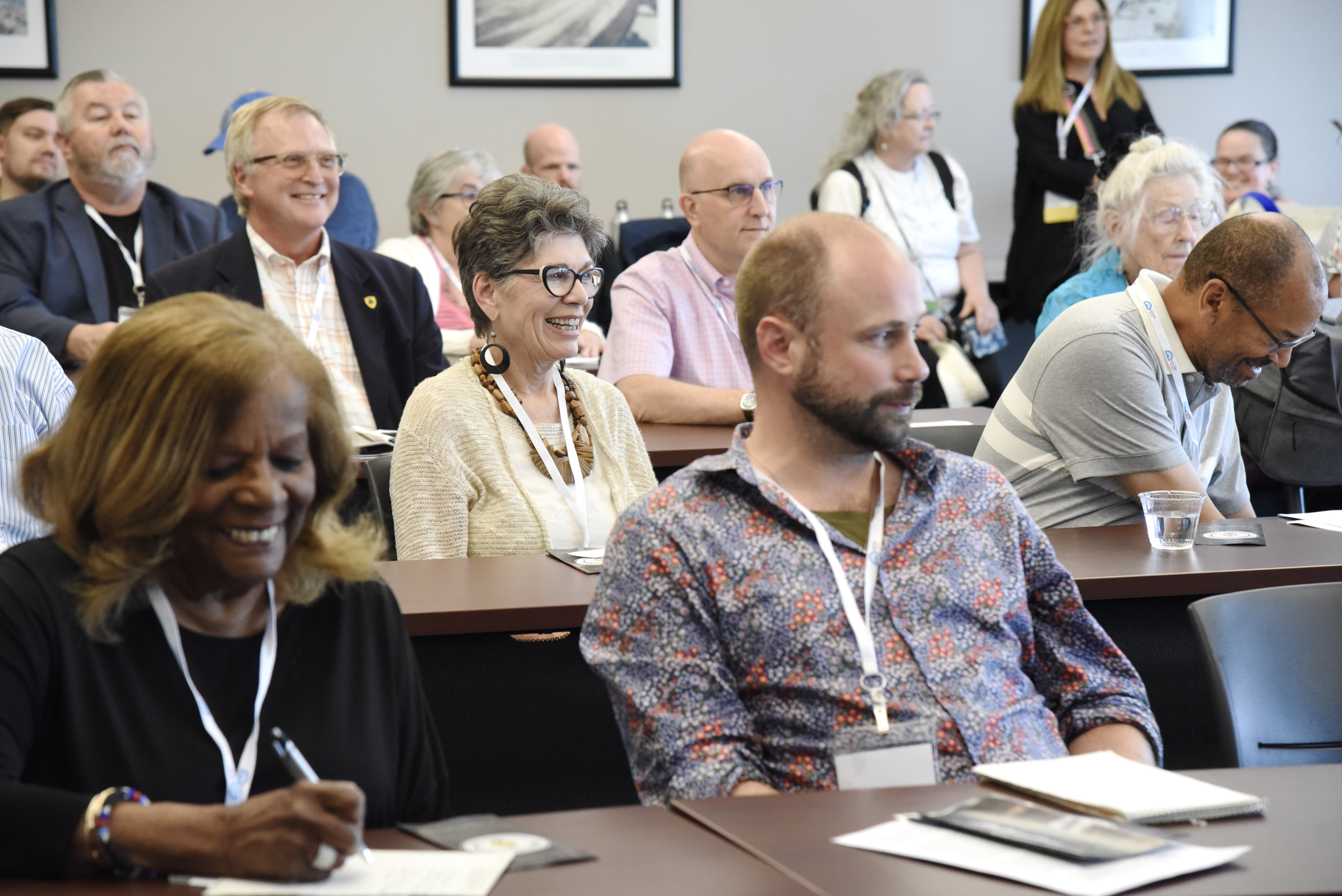 conference attendees in a session